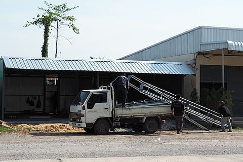 construction, labor, workers, doing work, architecture, transportation, mode of transportation, building exterior, built structure, land vehicle, day, nature, building, motor vehicle, no people, abandoned, outdoors, sky, business, truck, road, rail transportation, tree, city, 4K, CC0, public domain, royalty free