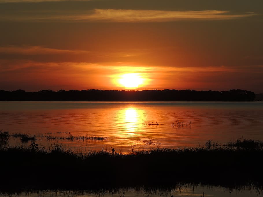 Sonnenuntergang, Sol, Landschaft, Schönheit in der Natur, Wasser, Himmel, Ruhe, Szenen - Natur, orange Farbe, ruhige Szene, Silhouette, Reflexion, idyllisch, wolke - himmel, Natur, keine Leute, See, Nicht-städtische Szene, Ufergegend, draußen, Sonne, romantischer Himmel, 4K