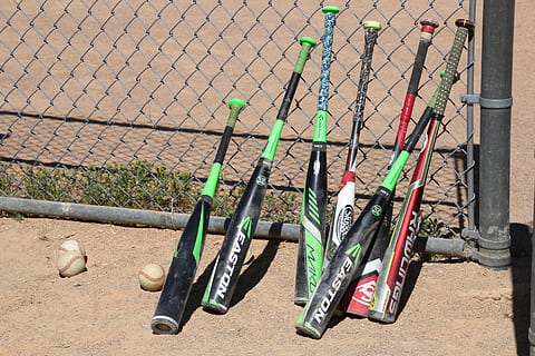 baseball, bat, equipment, day, no people, metal, fence, nature, sport, sunlight, outdoors, barrier, boundary, variation, high angle view, land, choice, close-up, hanging, security, large group of objects, shadow, 5K, CC0, public domain, royalty free