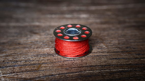 thread, spool, sewing, red, textiles, tailor, sew, old, retro, wood - material, technology, table, indoors, no people, berry fruit, industry, close-up, multi colored, equipment, art and craft, studio shot, selective focus, rustic, high angle view, arts culture and entertainment, photography themes, 4K, CC0, public domain, royalty free