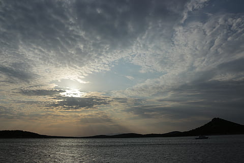 sky, clouds, marine, sunset, cloud - sky, water, beauty in nature, sea, scenics - nature, mountain, tranquility, tranquil scene, nature, waterfront, idyllic, no people, silhouette, sun, sunlight, outdoors, land, 5K, CC0, public domain, royalty free