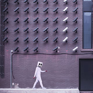 building, wall, structure, cctv, security, camera, window, people, white, clothing, attire, walking, full length, one person, architecture, standing, building exterior, real people, built structure, day, women, outdoors, child, childhood, adult, side view, casual clothing, wall - building feature, leisure activity, city, 2K, CC0, public domain, royalty free