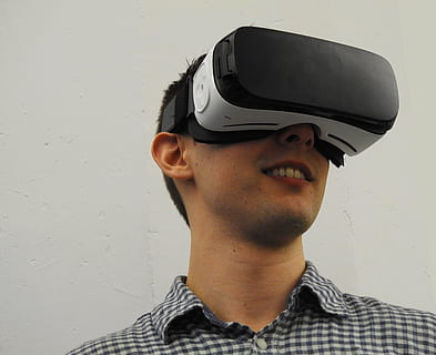 virtual reality, technology, reality, virtual, headset, tech, entertainment, futuristic, device, man, one person, wall - building feature, real people, headshot, indoors, front view, glasses, virtual reality simulator, looking, portrait, lifestyles, young men, smiling, leisure activity, men, casual clothing, wireless technology, young adult, 3-d glasses, mouth open, 4K, CC0, public domain, royalty free