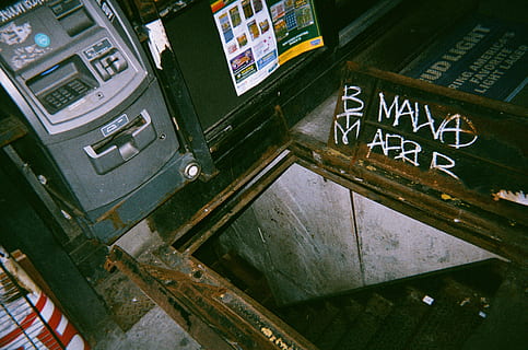 gray atm machine, banister, handrail, machine, arcade game machine, staircase, plywood, wood, electronics, vehicle, transportation, slate, blackboard, dessert, cream, icing, cake, food, creme, railing, pub, text, communication, western script, high angle view, no people, architecture, day, sign, indoors, built structure, arts culture and entertainment, wood - material, tilt, still life, script, business, close-up, store, 2K, CC0, public domain, royalty free
