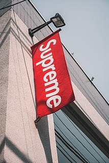 supreme flag, banner, text, tokyo, japan, supreme harajuku, brand, clothing brand, bape, street, supreme, store, retail, hypebeast, hype, awning, canopy, curtain, hospital, symbol, sign, communication, red, western script, low angle view, day, capital letter, no people, built structure, architecture, warning sign, nature, road, information, road sign, building exterior, information sign, hanging, sunlight, message, 4K, CC0, public domain, royalty free