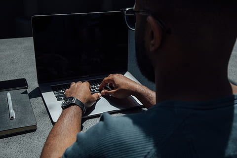 man, using, laptop computer, desk, electronics, computer, pc, human, person, laptop, screen, display, lcd screen, monitor, keyboard, finger, computer hardware, hardware, computer keyboard, hand-held computer, video gaming, sitting, hand, phone, technology, communication, wireless technology, men, one person, connection, indoors, adult, table, using laptop, working, human body part, computer equipment, furniture, occupation, typing, human limb, 5K, CC0, public domain, royalty free
