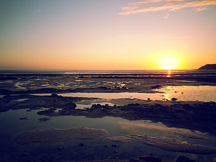 lying, sun, beach, water, sky, sea, scenics - nature, sunset, beauty in nature, tranquility, land, tranquil scene, horizon, horizon over water, nature, cloud - sky, idyllic, reflection, no people, orange color, outdoors, 2K, CC0, public domain, royalty free