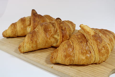 distance, bread, baker, food, food and drink, baked, croissant, french food, close-up, no people, indoors, table, freshness, brown, studio shot, still life, ready-to-eat, white background, snack, breakfast, wood - material, temptation, 5K, CC0, public domain, royalty free