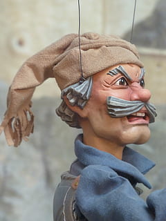 puppet, man, human, upset, grim, evil, applied, doll, puppeteer, acting, headshot, portrait, one person, focus on foreground, real people, close-up, lifestyles, leisure activity, clothing, looking, young adult, looking away, men, hat, males, smiling, front view, adult, warm clothing, scarf, 4K, CC0, public domain, royalty free