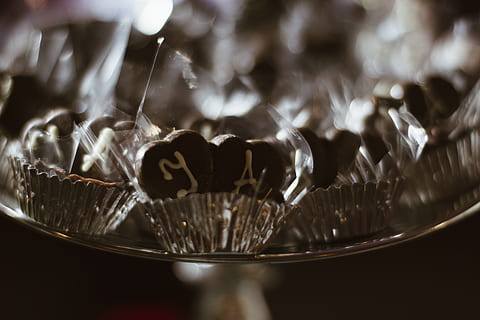 brigadier, chocolate, confectionery, food and drink, close-up, indoors, selective focus, human hand, food, hand, kitchen utensil, indulgence, human body part, eating utensil, freshness, focus on foreground, sweet food, text, drink, refreshment, pouring, temptation, silver colored, 4K, CC0, public domain, royalty free
