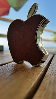 lighter, apple, clone, wood - material, table, no people, close-up, indoors, still life, music, day, selective focus, food and drink, arts culture and entertainment, musical equipment, musical instrument, single object, publication, brown, focus on foreground, string instrument, drink, personal accessory, 5K, CC0, public domain, royalty free