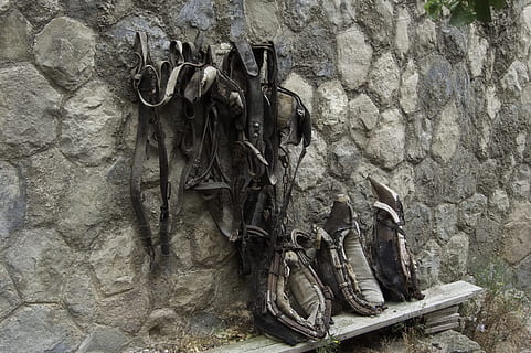 objects, old harness, horses, wall - building feature, no people, day, architecture, built structure, wall, old, nature, outdoors, solid, textured, building exterior, damaged, rock, stone wall, low angle view, close-up, rough, abandoned, rock - object, 2K, CC0, public domain, royalty free
