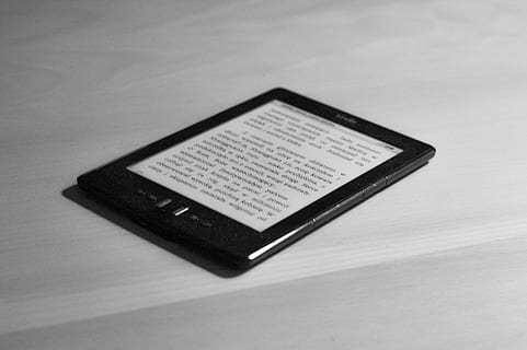 kindle, book, e-reader, reading, technology, single object, studio shot, indoors, no people, communication, connection, high angle view, wireless technology, text, white background, data, paper, still life, internet, close-up, copy space, gray, 2K, CC0, public domain, royalty free