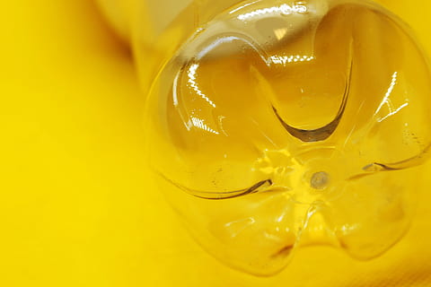 bottle, abstract, plastic, empty, yellow, food and drink, food, close-up, freshness, indoors, no people, healthy eating, wellbeing, high angle view, backgrounds, glass - material, still life, full frame, refreshment, egg yolk, drink, selective focus, studio shot, glass, pitcher - jug, purity, 5K, CC0, public domain, royalty free